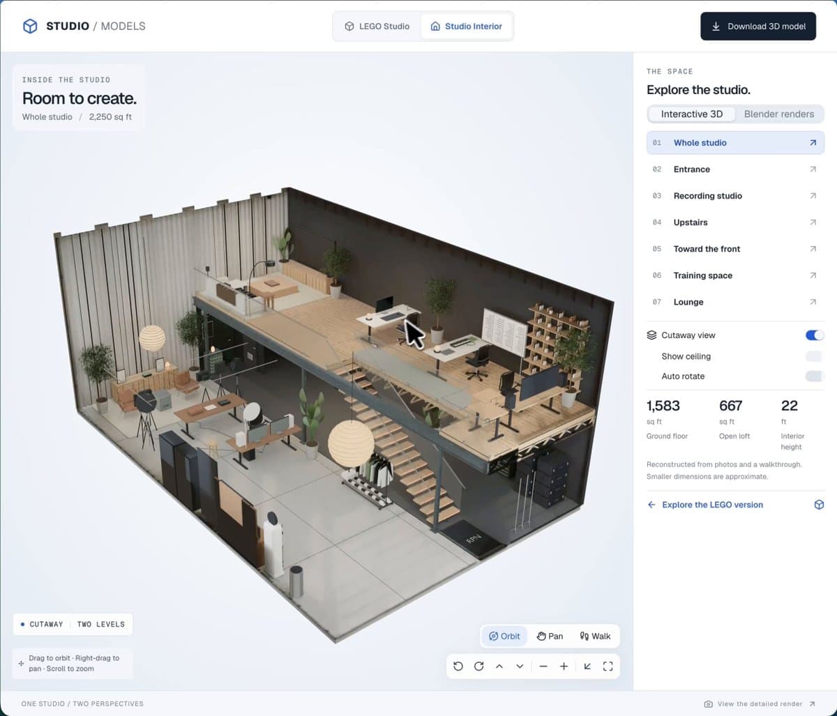 A cutaway 3D model of Roberto Nickson's two-level studio, showing the desks, staircase, and lounge